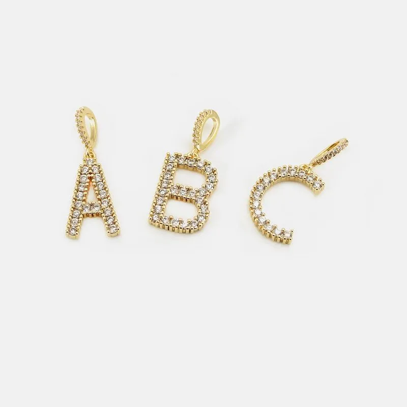 Initiële hanger verguld